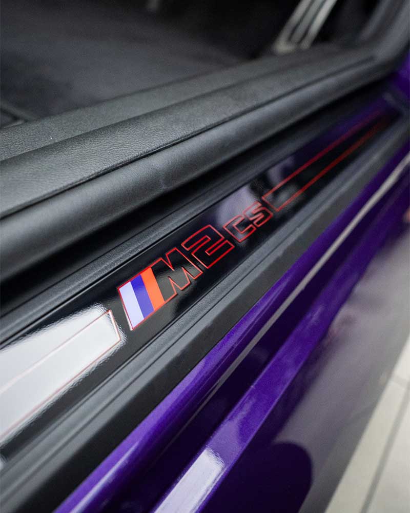 Door sill protection film fitted to the painted sill of a vehicle