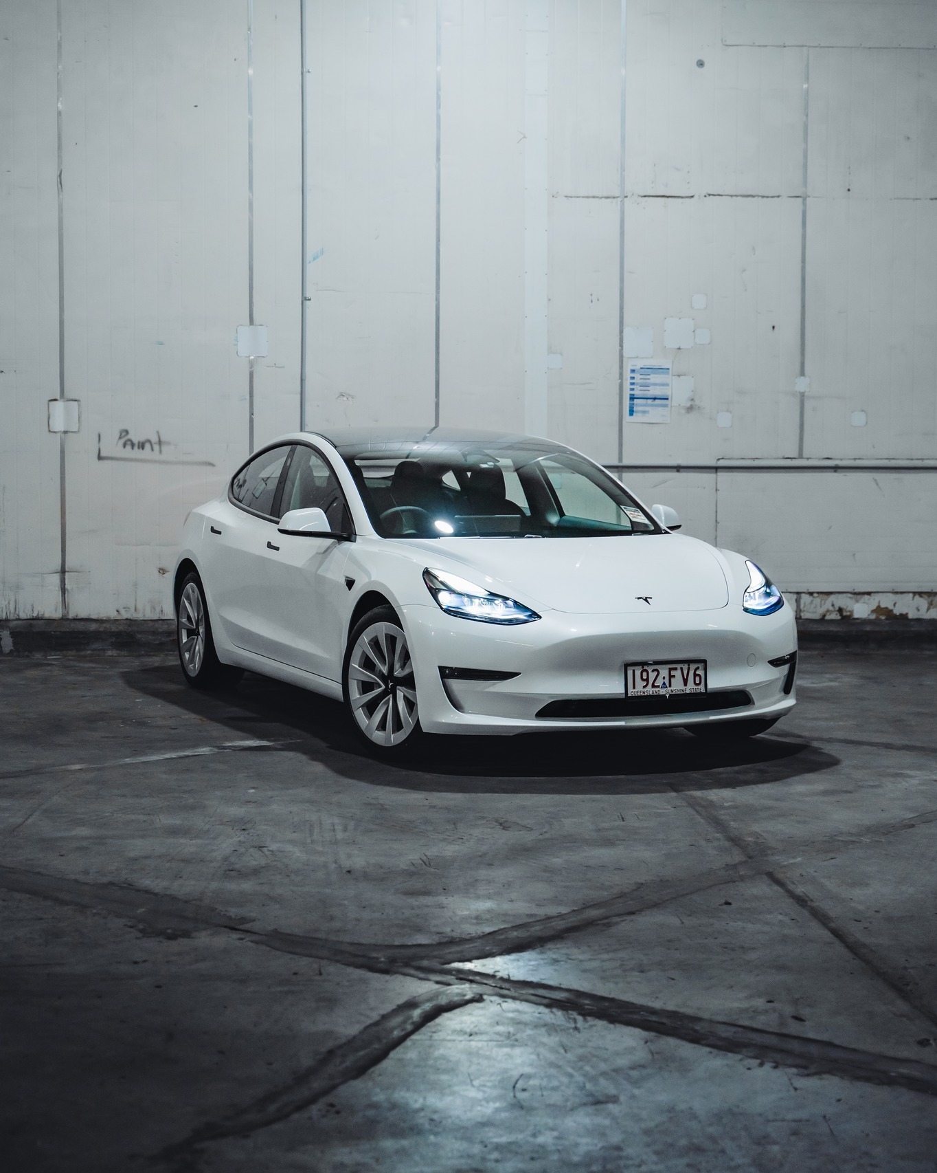 Tesla finished with paint protection film and ceramic coating showing a deep gloss finish