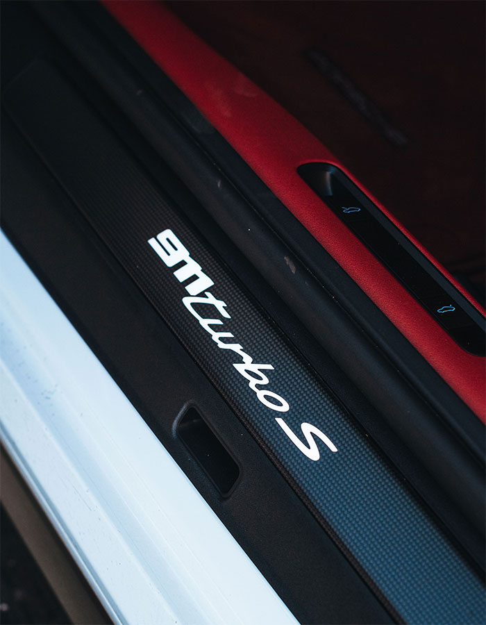 Paint protection film fitted to a car door sill